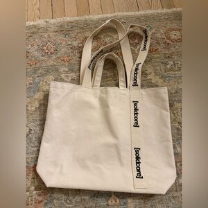 Unused solidcore cream tote bag